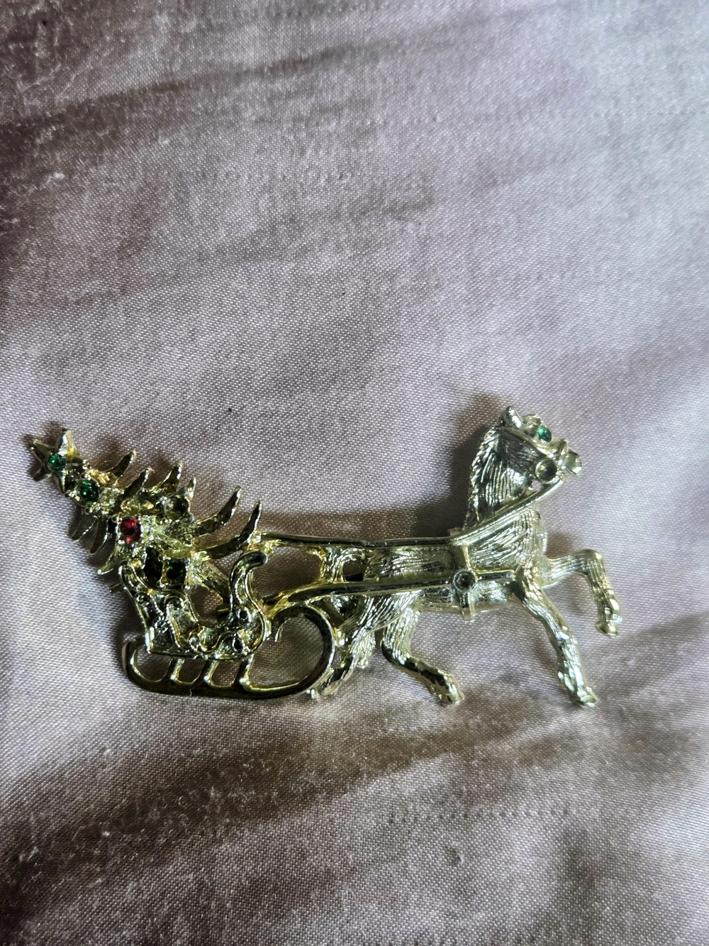 Gold-tone Reindeer & Sleigh And Tree Brooch with Colored Rhinestones